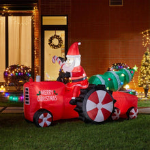 11 ft. Lighted Inflatable Santa on Tractor Decor